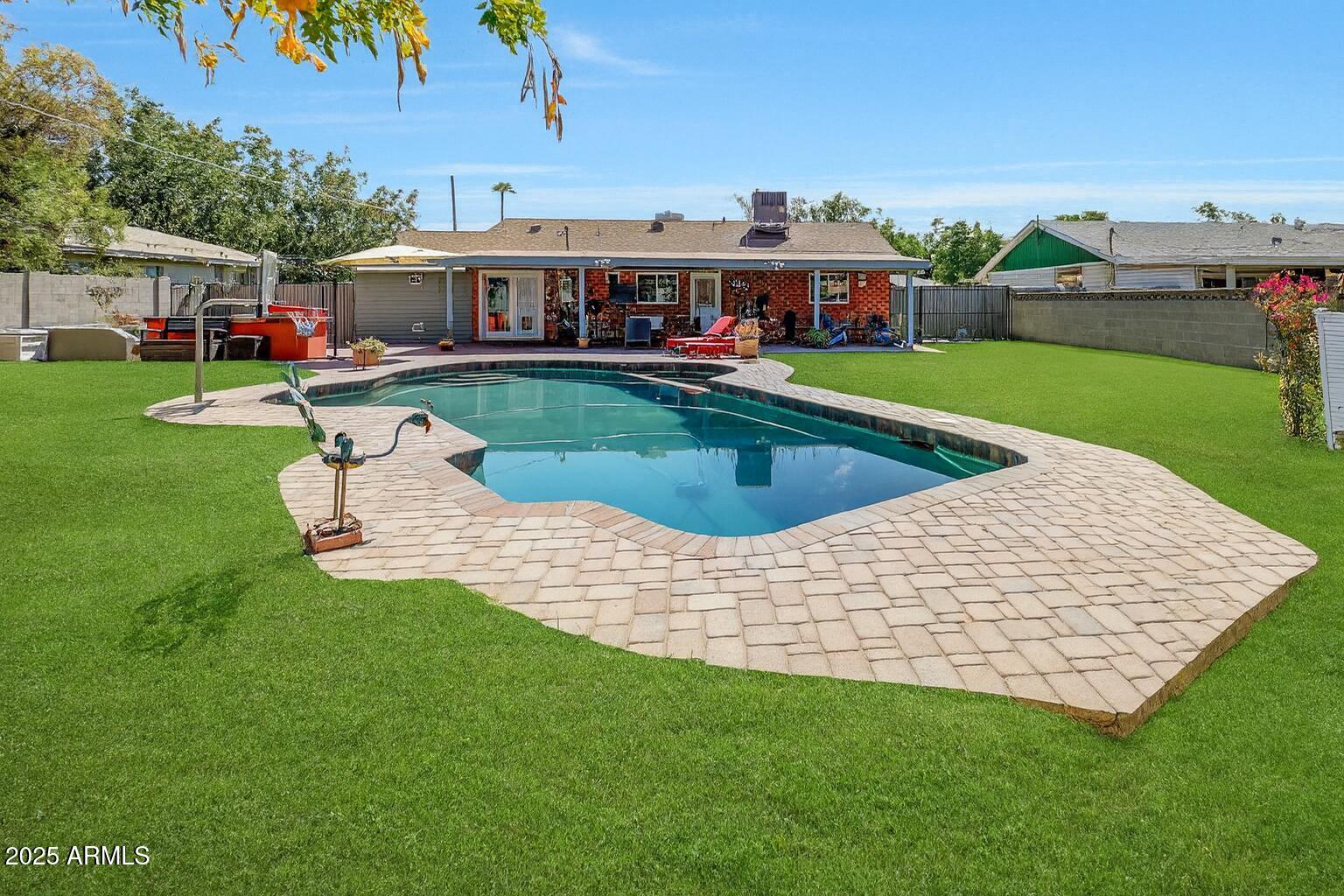 4108 East Edgemont Avenue Phoenix, AZ 85018 - Photo 62 of 118 an aerial view of a house with swimming pool garden and patio