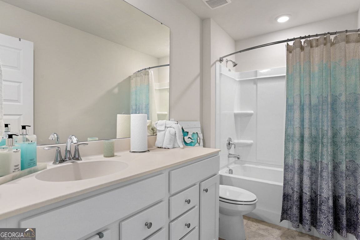 102 Franklins Walk Rincon, GA 31326 - Photo 38 of 51 a bathroom with a sink a toilet and shower