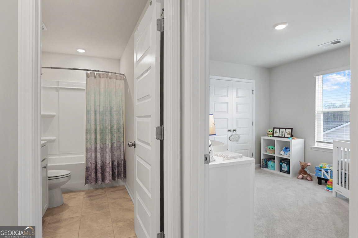102 Franklins Walk Rincon, GA 31326 - Photo 39 of 51 a bathroom with a sink a toilet and shower