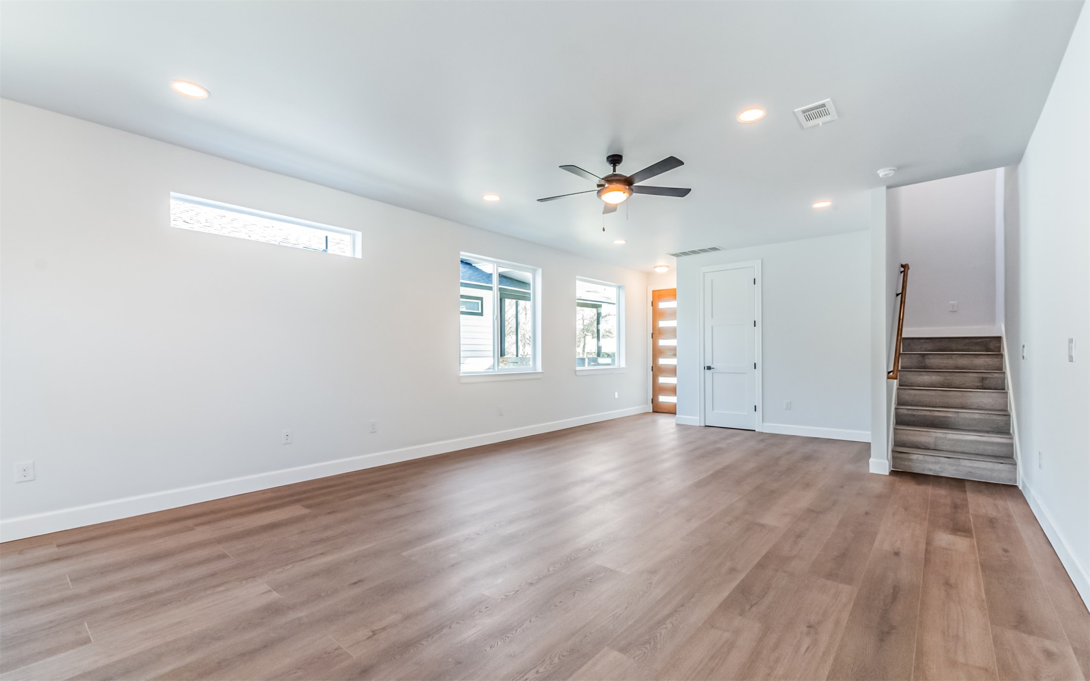 1130 Spur Street, Unit A Austin, TX 78721 - Photo 6 of 31 Unfurnished dining area featuring ceiling fan and recessed lighting