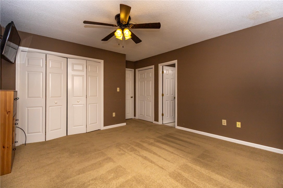 1302 Leeward Road Anderson, SC 29625 - Photo 25 of 50 A restful bedroom offers comfort with soft carpet and a convenient ceiling fan.