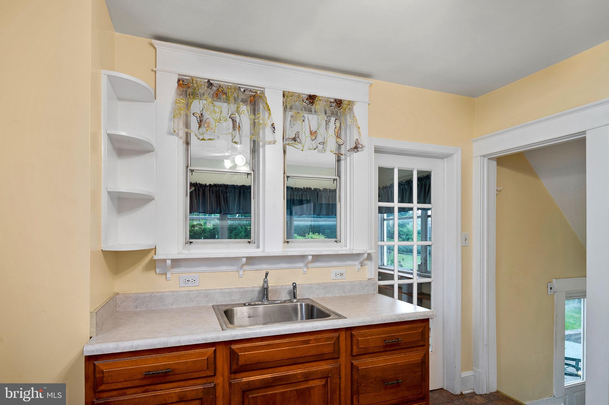 1240 Greystone Road Halethorpe, MD 21227 - Photo 18 of 41 a bathroom with a sink and a window