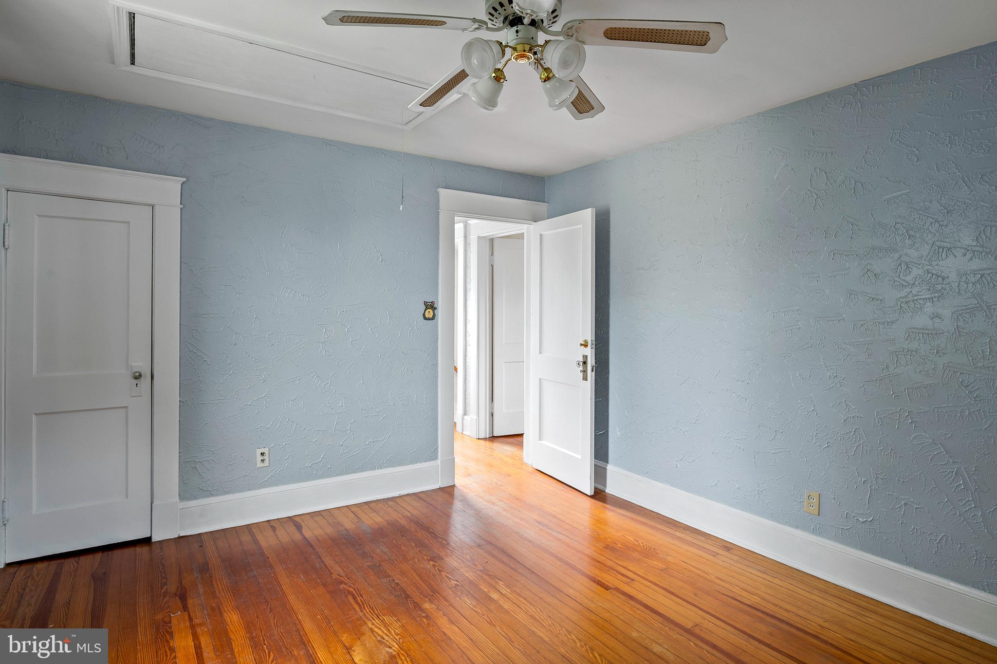 1240 Greystone Road Halethorpe, MD 21227 - Photo 28 of 41 a view of an empty room and wooden floor