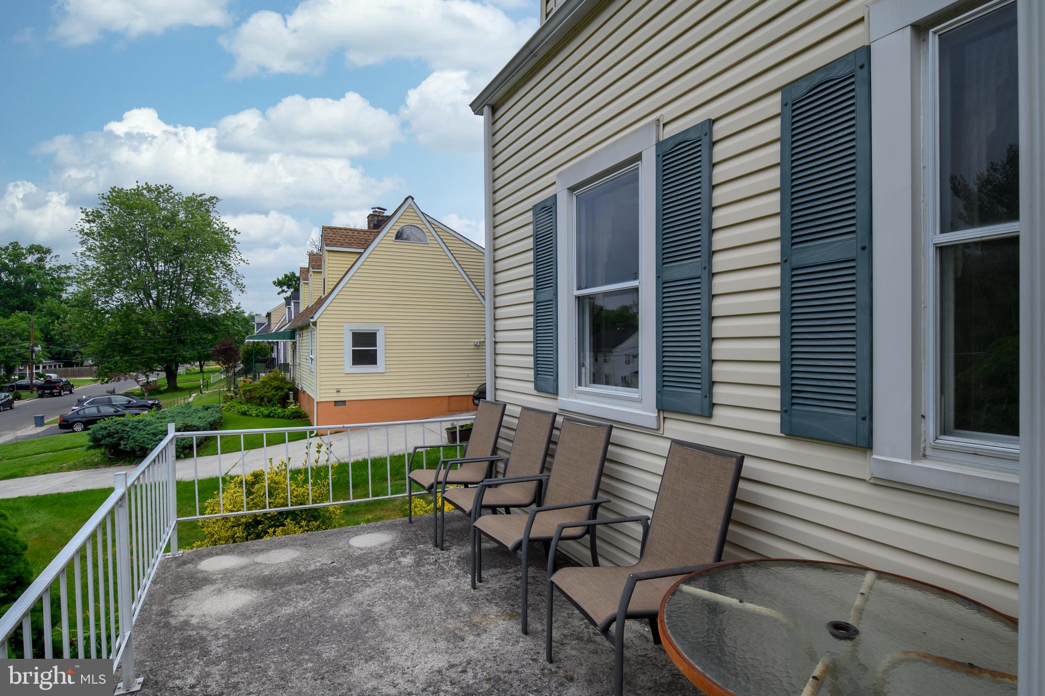 1240 Greystone Road Halethorpe, MD 21227 - Photo 5 of 41 a view of backyard with deck and outdoor seating