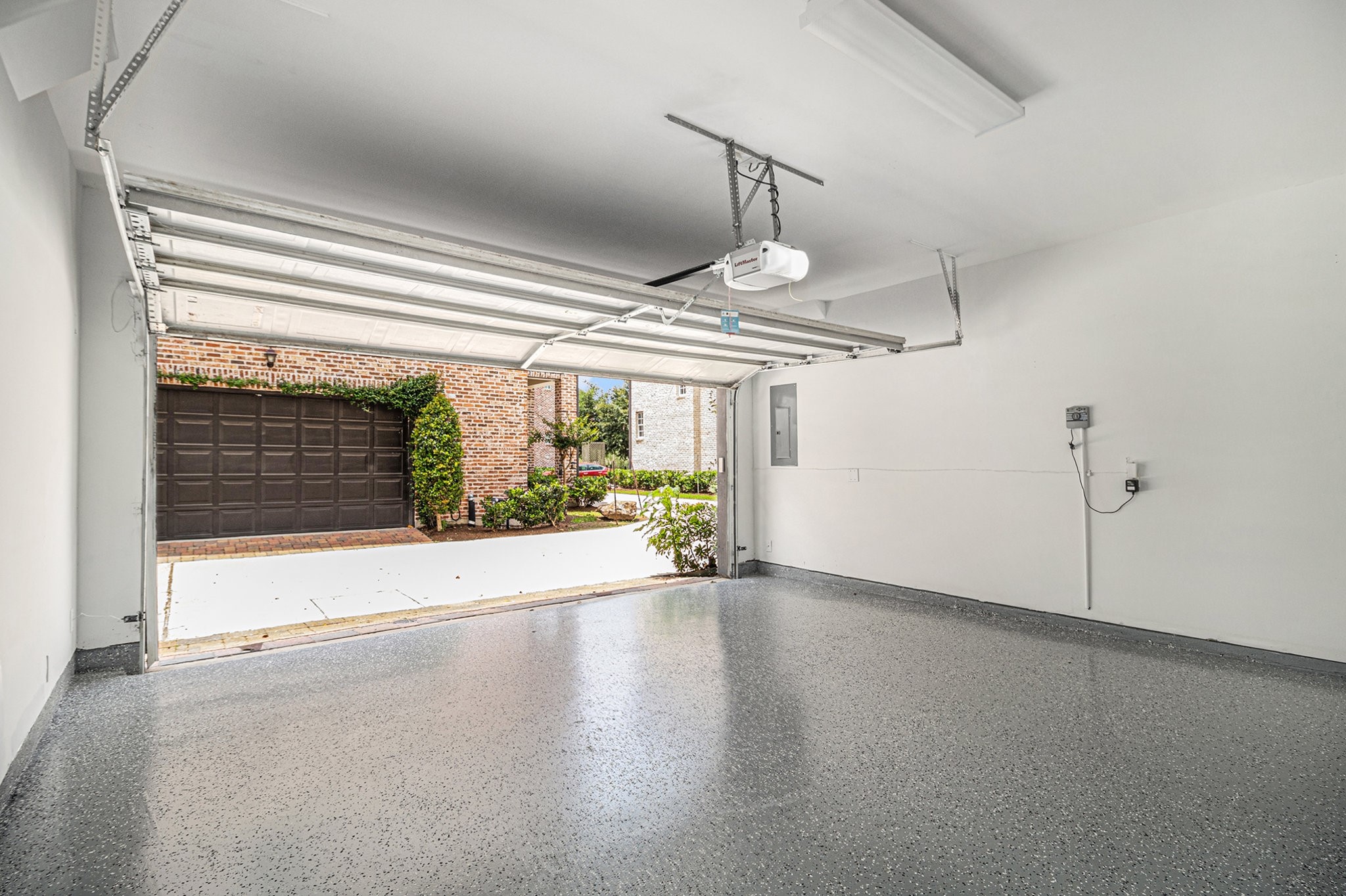9674 Knight Road Houston, TX 77045 - Photo 21 of 21 a view of an empty room with wooden floor and a window