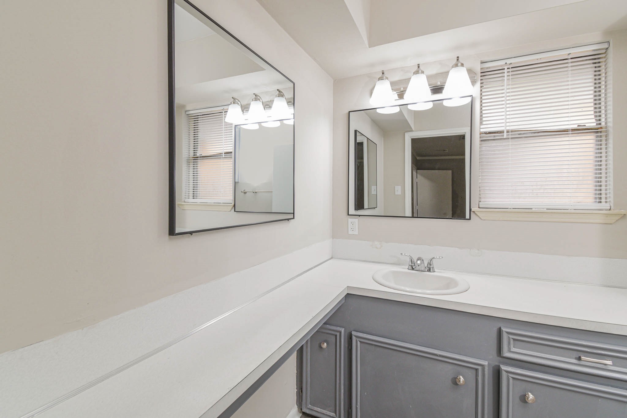 17311 Methil Drive Spring, TX 77379 - Photo 17 of 24 a bathroom with a sink and a mirror