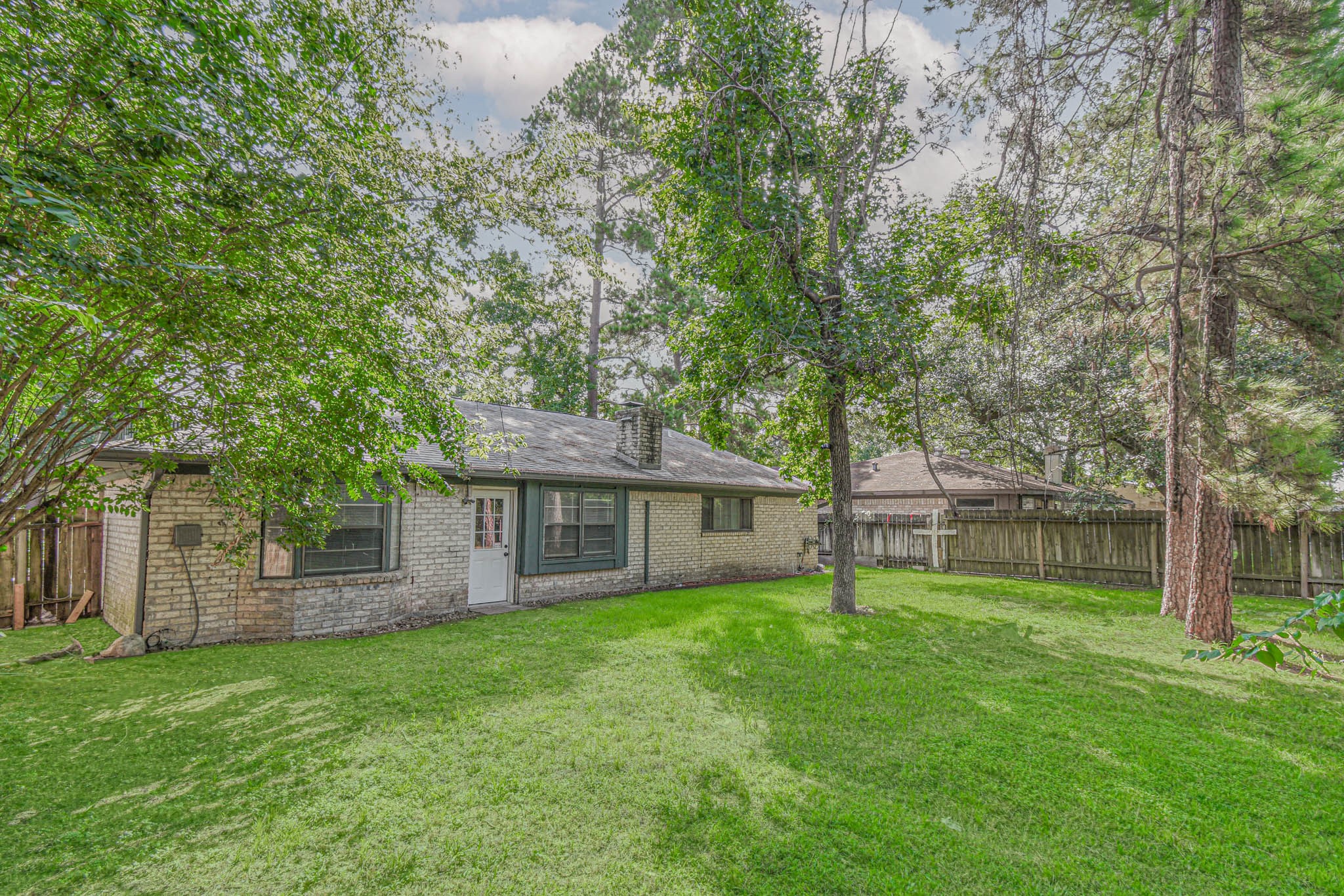 17311 Methil Drive Spring, TX 77379 - Photo 23 of 24 front view of a house with a yard