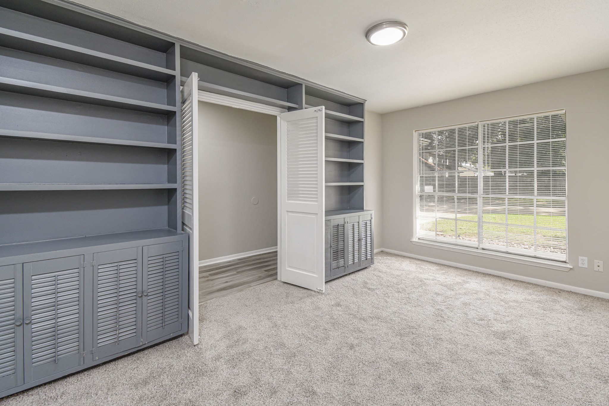 17311 Methil Drive Spring, TX 77379 - Photo 3 of 24 a view of an empty room with a window