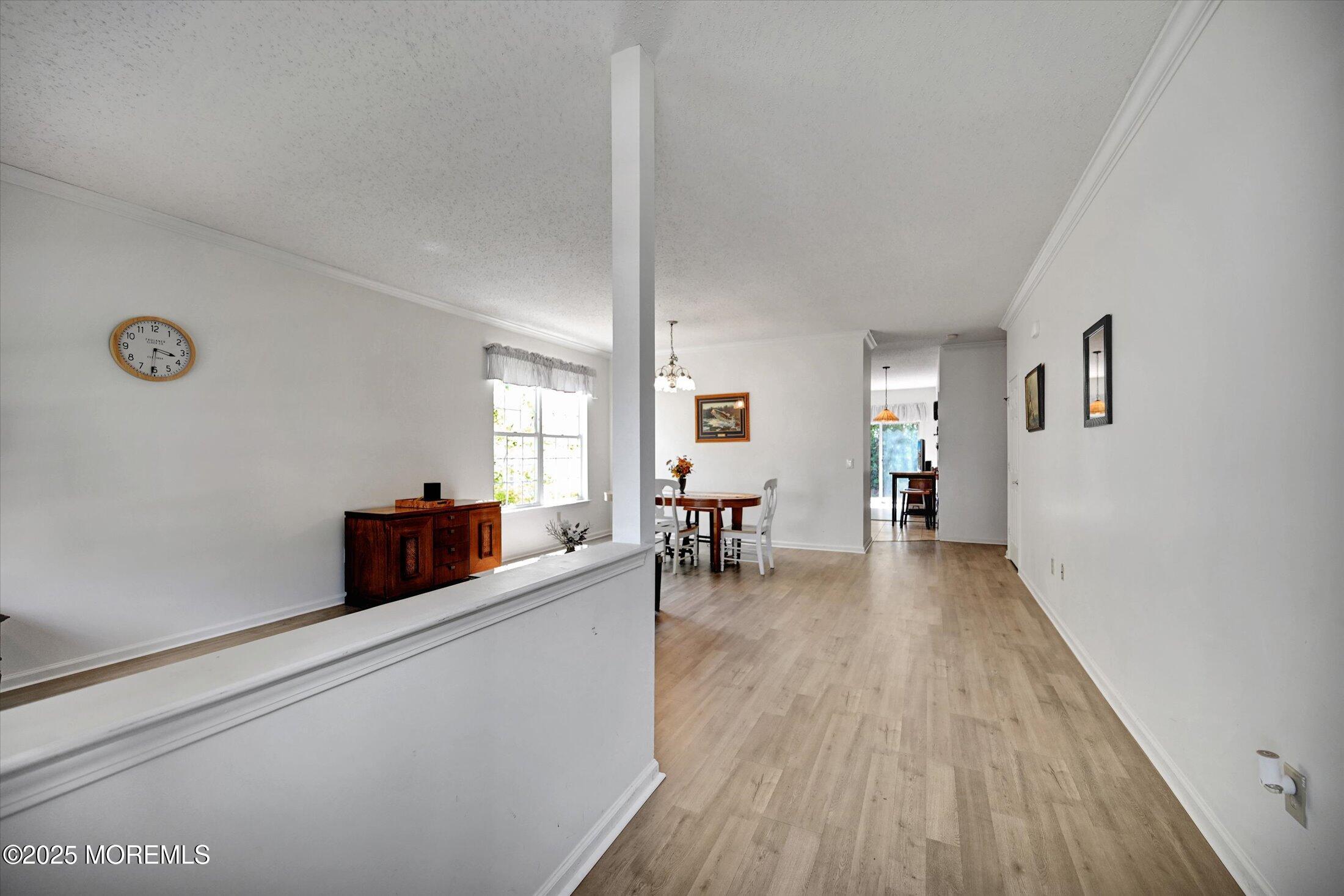 56 Quail Road Barnegat, NJ 08005 - Photo 2 of 30 a living room with furniture and a wooden floor