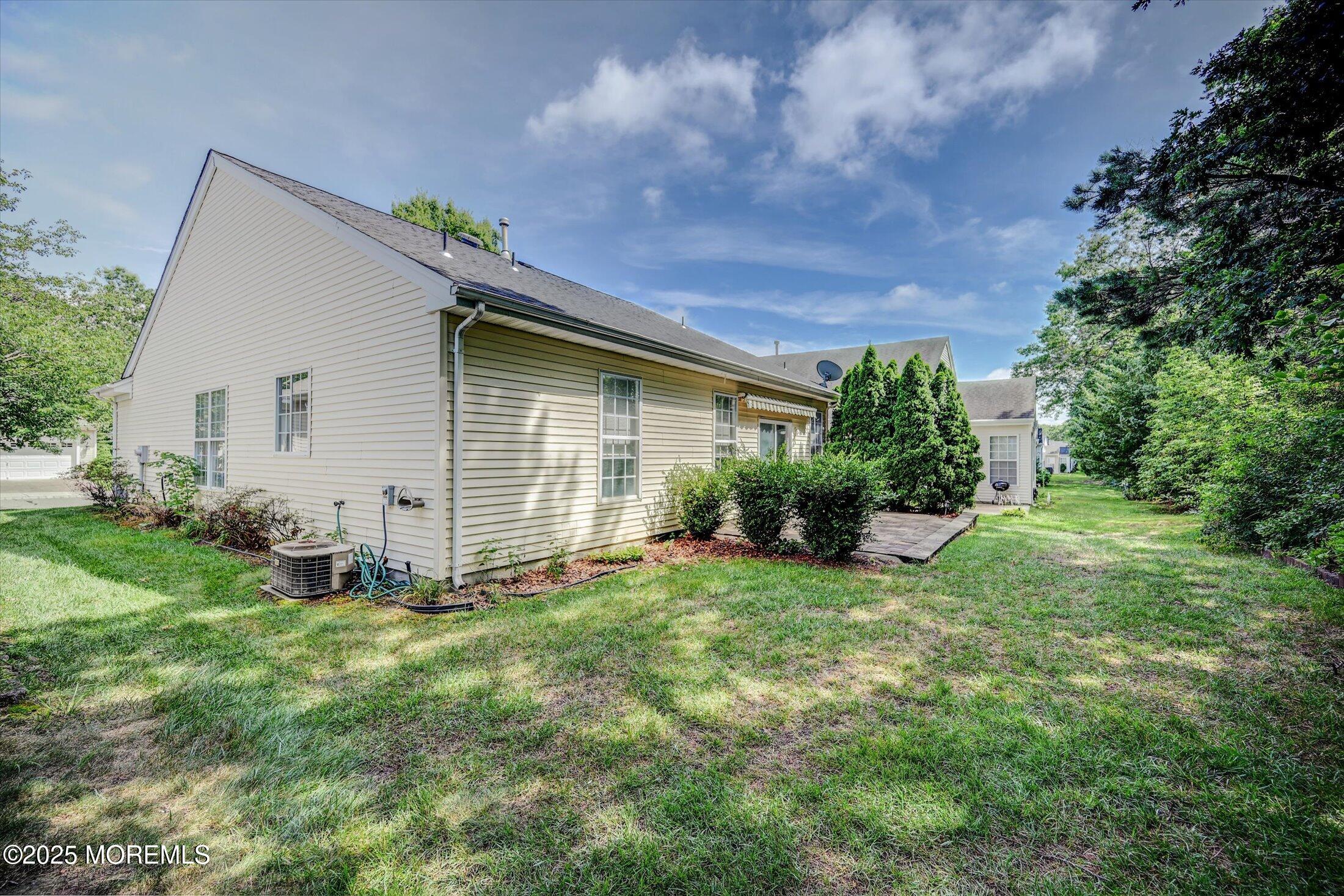 56 Quail Road Barnegat, NJ 08005 - Photo 27 of 30 a front view of house with yard and green space