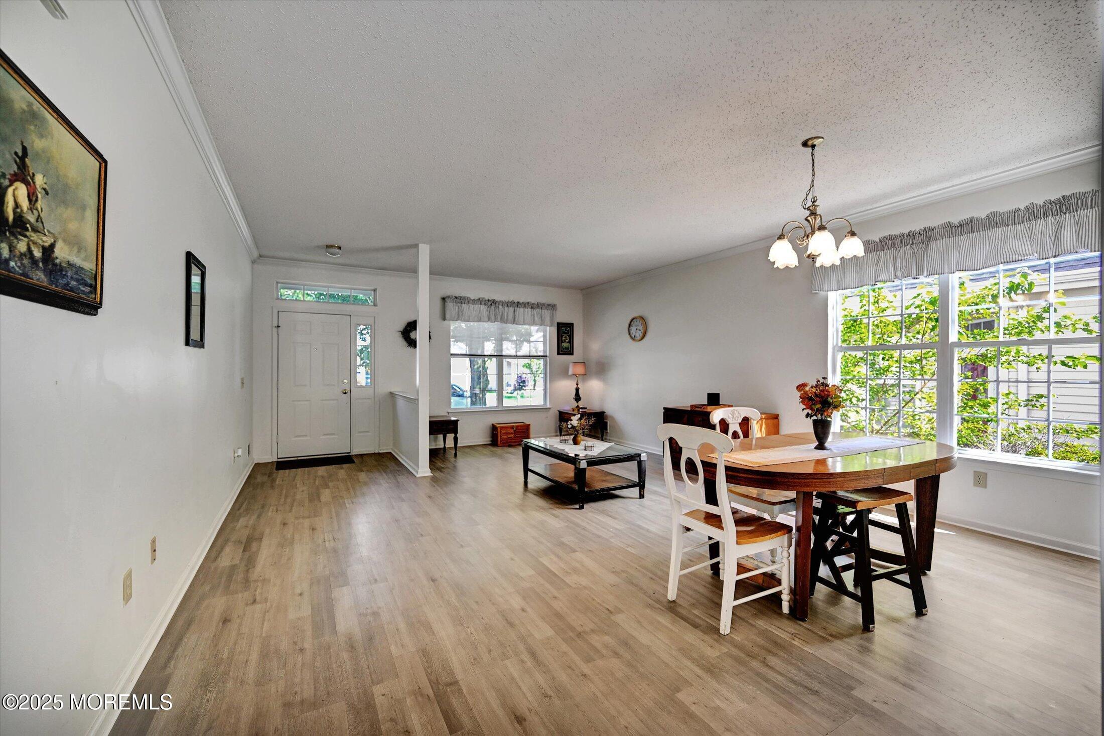56 Quail Road Barnegat, NJ 08005 - Photo 3 of 30 a dining room with furniture window wooden floor