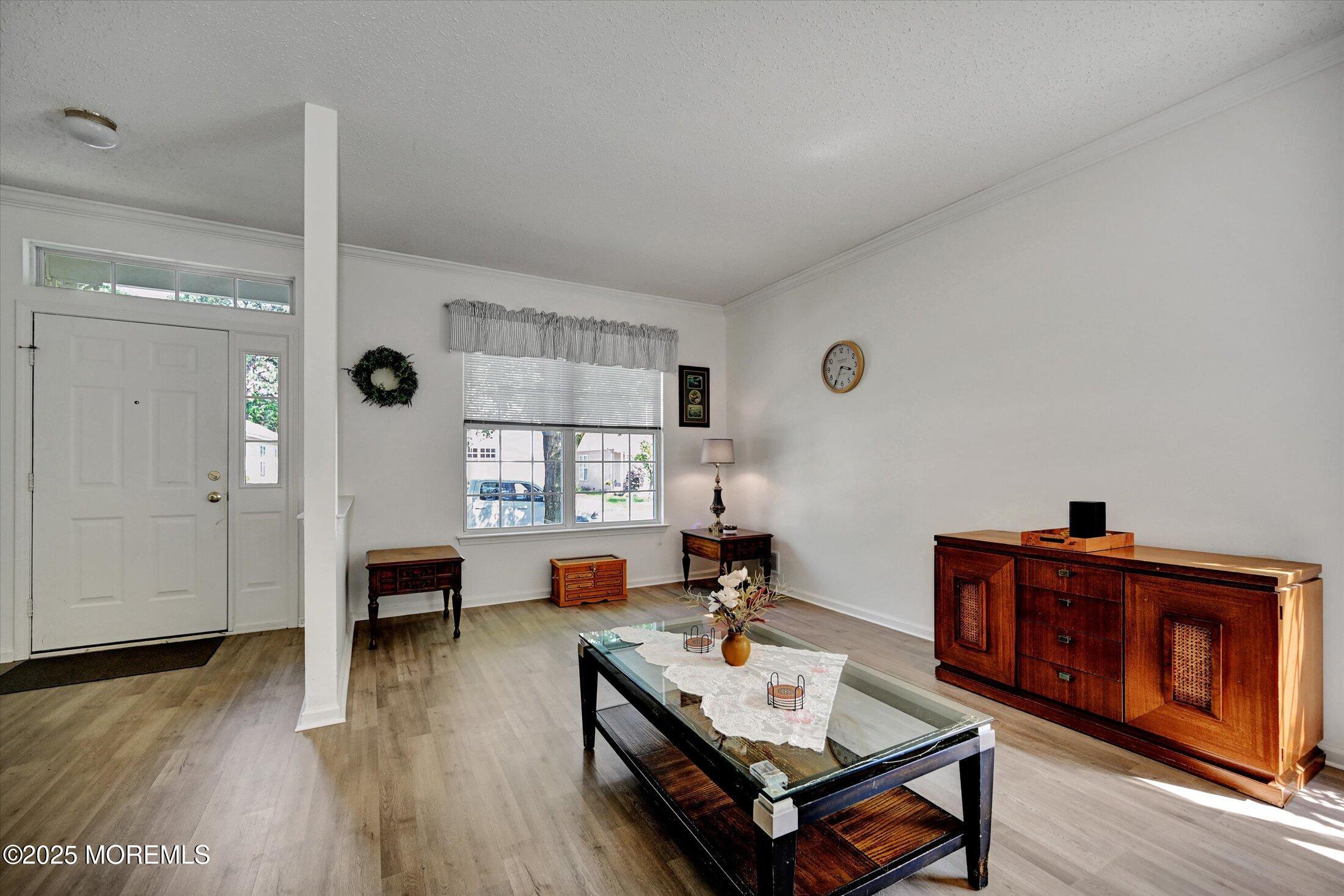 56 Quail Road Barnegat, NJ 08005 - Photo 4 of 30 a living room with furniture and wooden floor