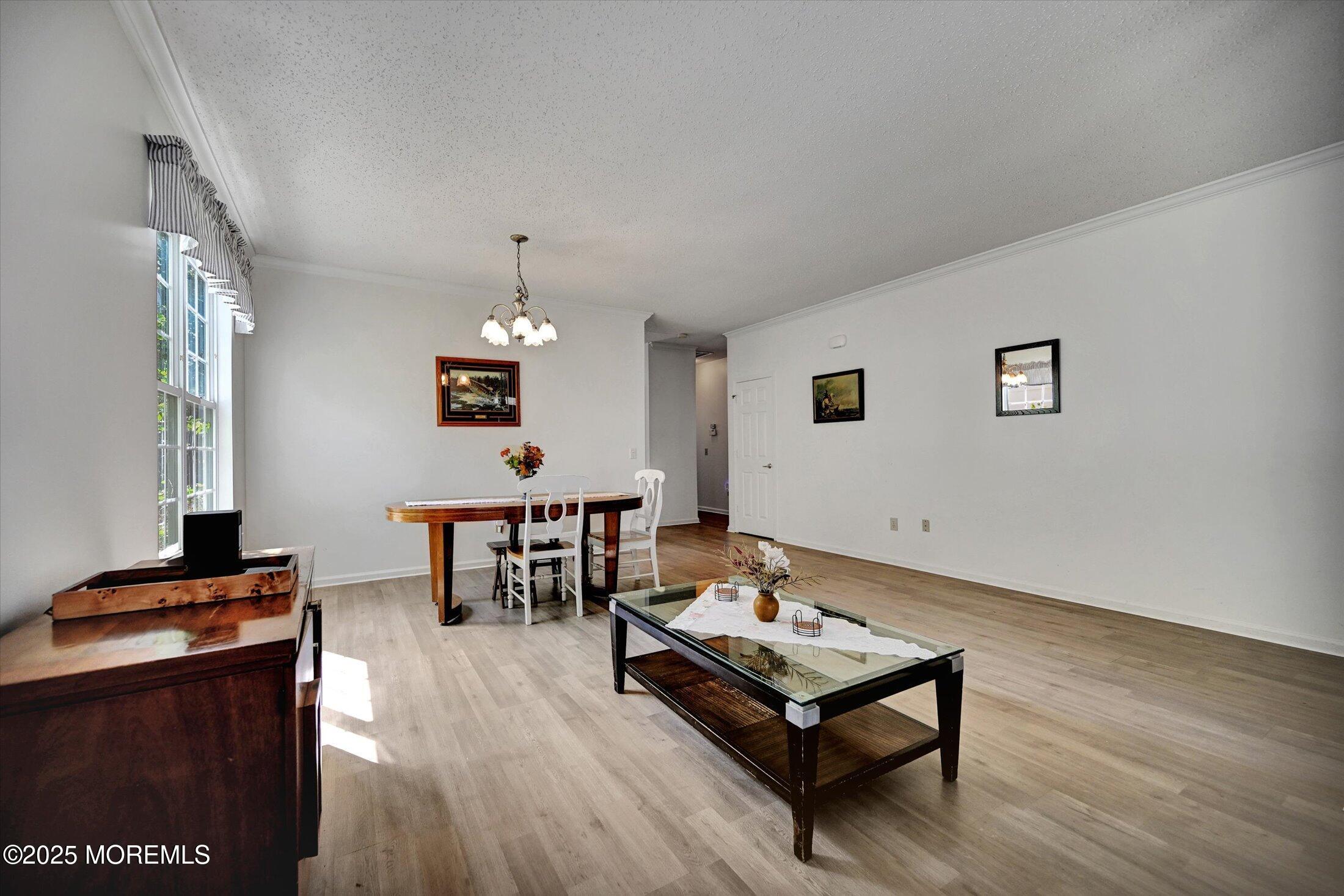 56 Quail Road Barnegat, NJ 08005 - Photo 5 of 30 a living room with furniture and wooden floor