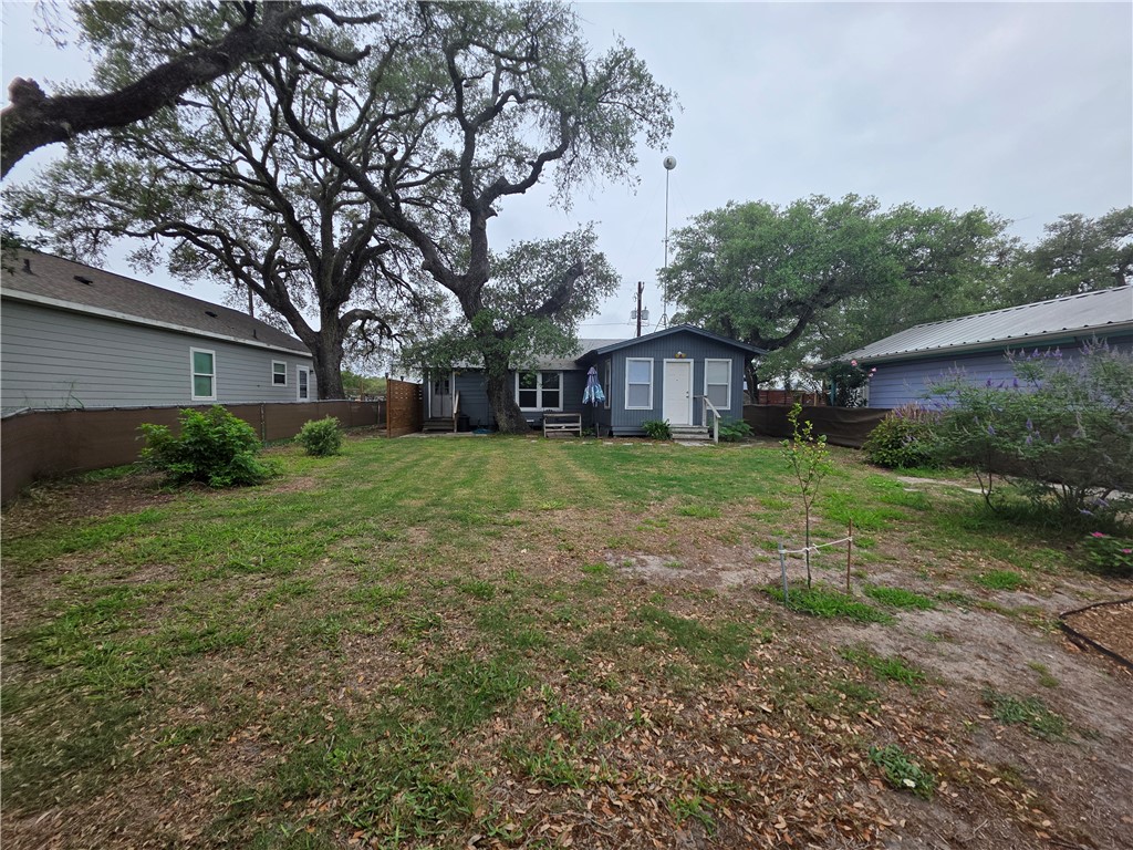 208 North 3rd Street Fulton, TX 78358 - Photo 23 of 23 a view of a house with a yard and sitting area