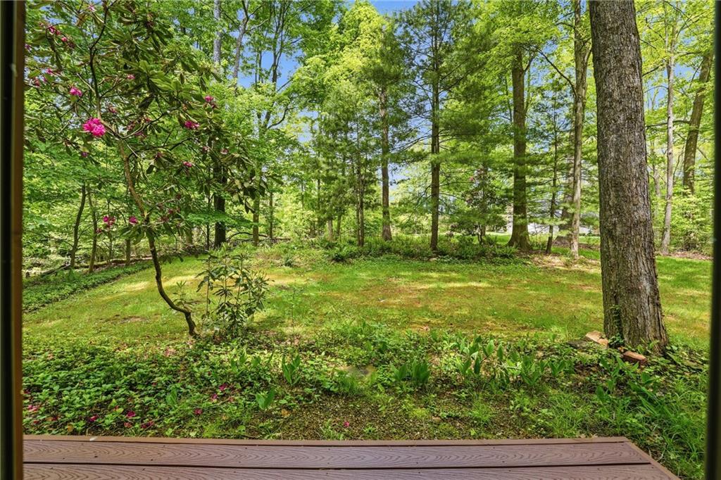 909 Apache Trail Mercer, PA 16137 - Photo 19 of 39 main floor bedroom deck and yard