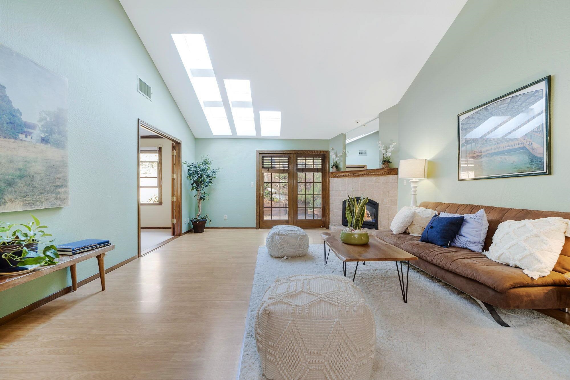 23685 Marble Quarry Road, Unit 53 Columbia, CA 95310 - Photo 1 of 1 a living room with furniture and a fireplace