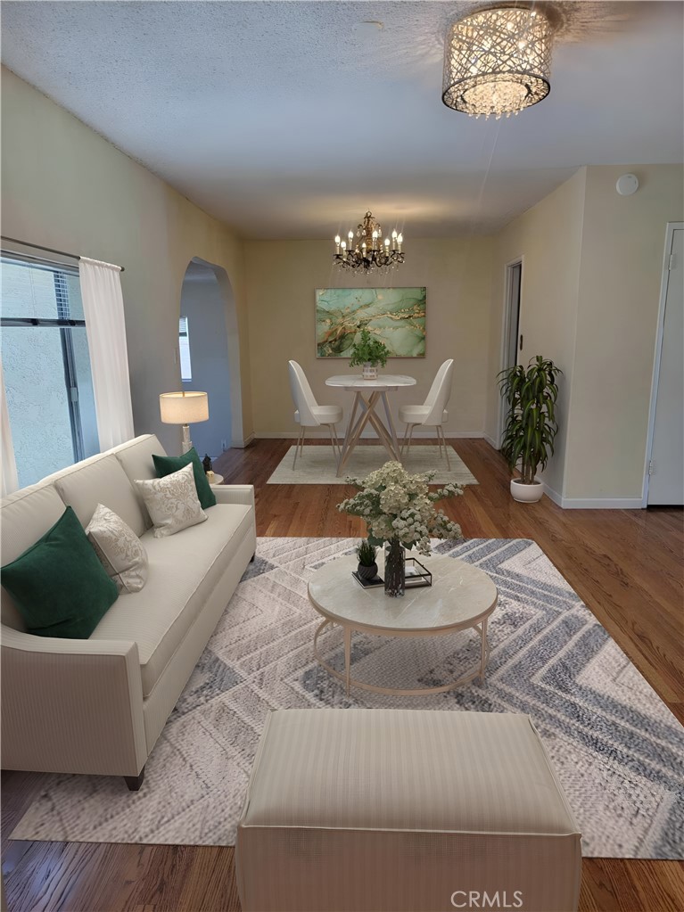 15113 Studebaker Road Norwalk, CA 90650 - Photo 5 of 8 Living room looking into dining room.