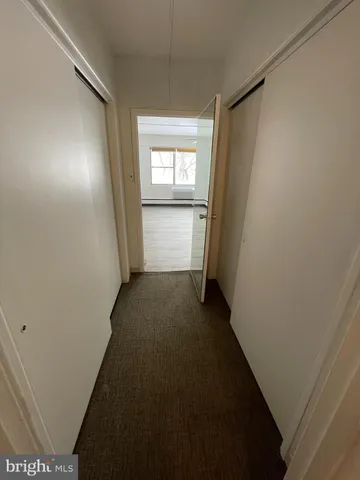 a view of a room that has a window