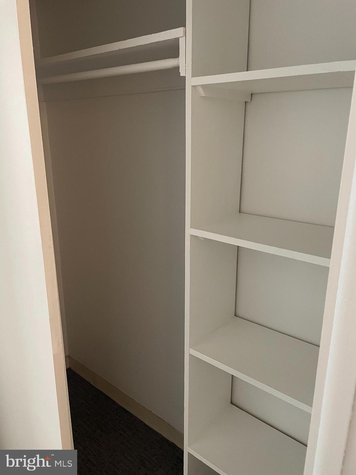 7900 Old York Road, Unit 311B Elkins Park, PA 19027 - Photo 16 of 22 a view of walk in closet with empty racks