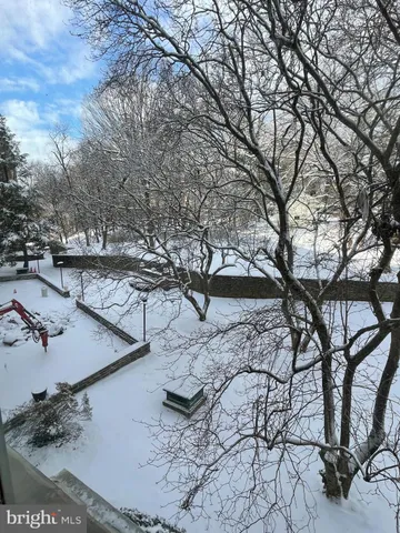 a view of a backyard of the house