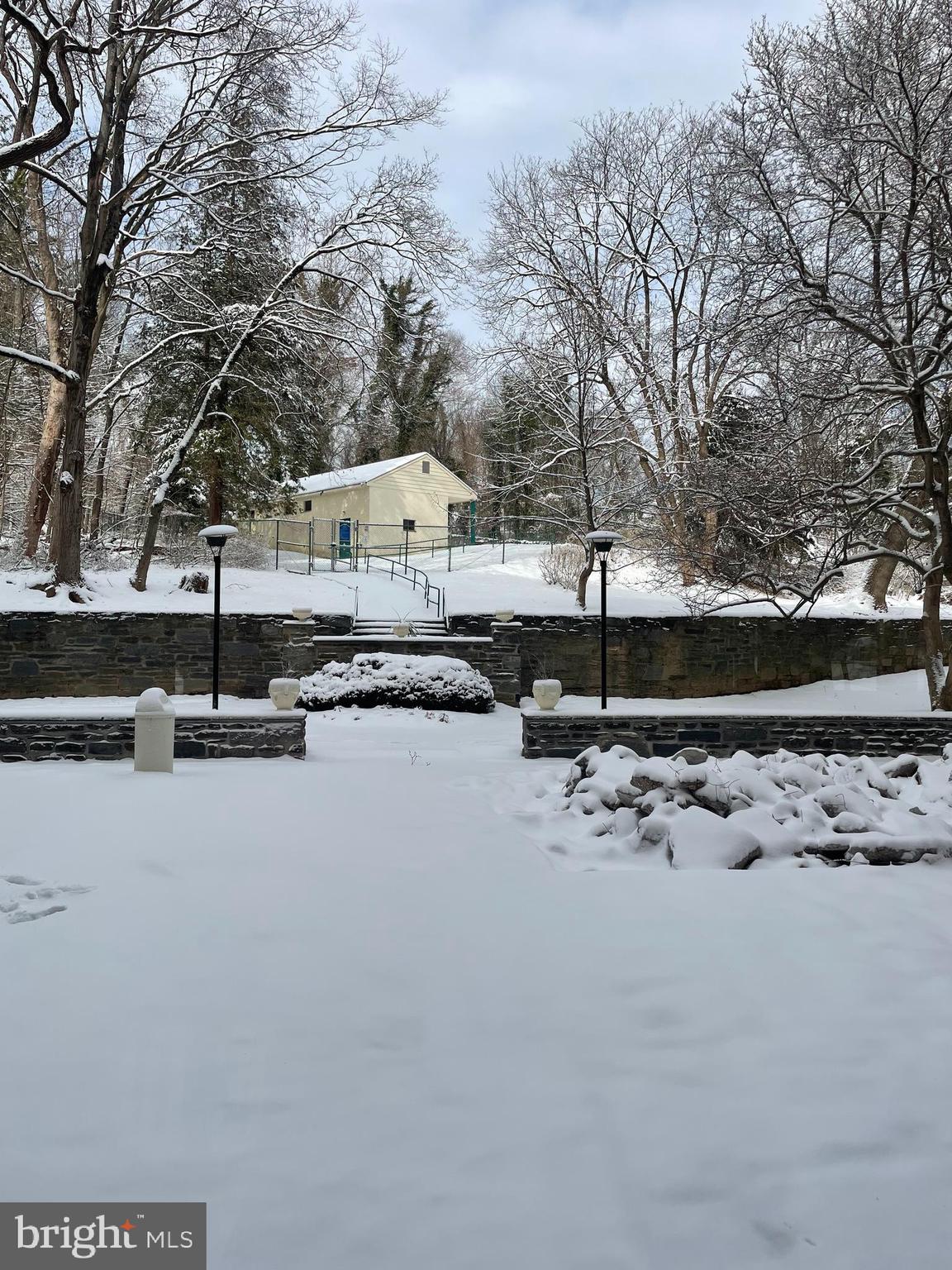 7900 Old York Road, Unit 311B Elkins Park, PA 19027 - Photo 20 of 22 a view of a snow in the yard