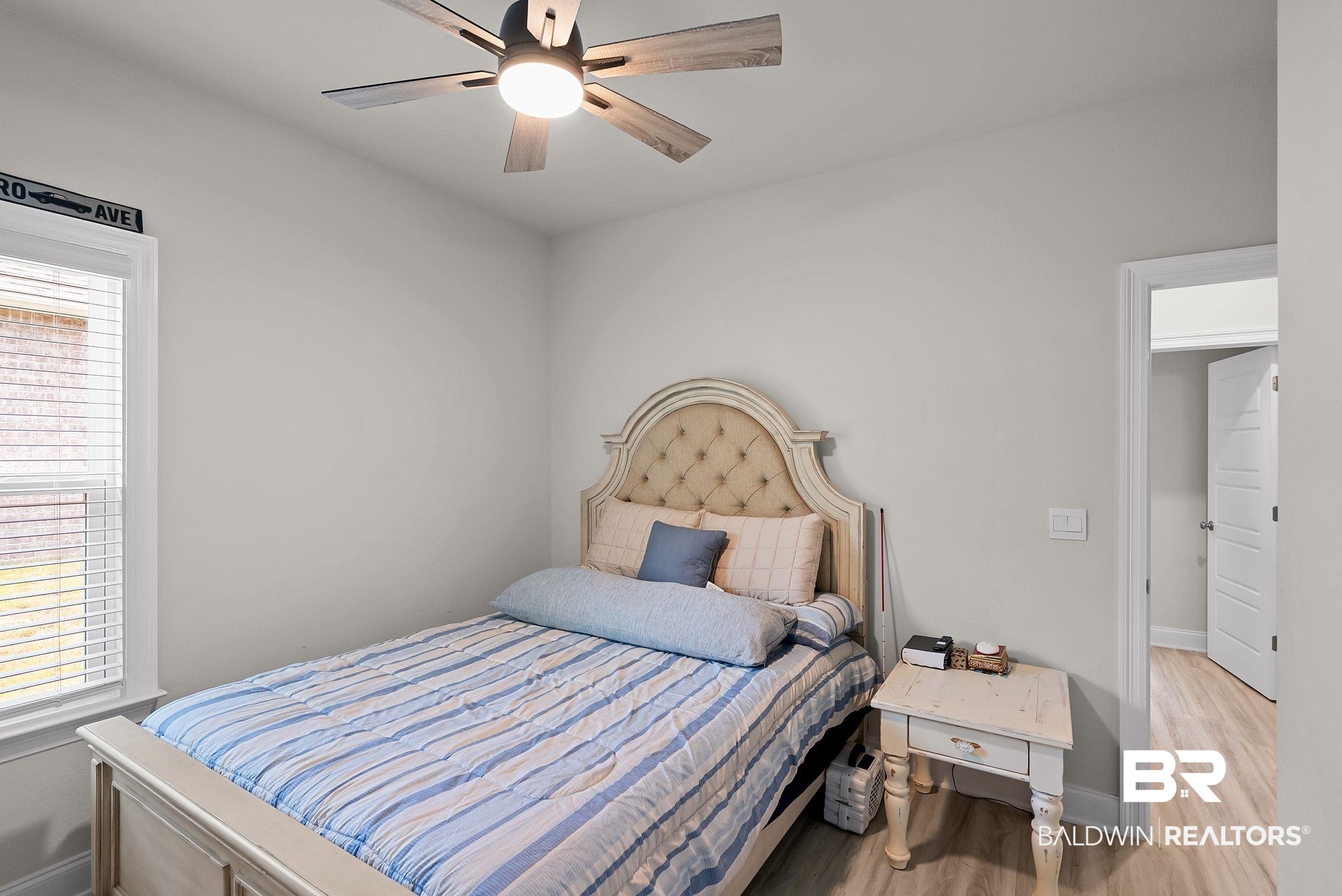 13966 Antler Hl Road Daphne, AL 36527 - Photo 22 of 44 Interior room featuring light-colored walls and wood-finish flooring