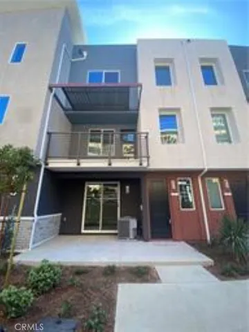 a front view of a building with windows