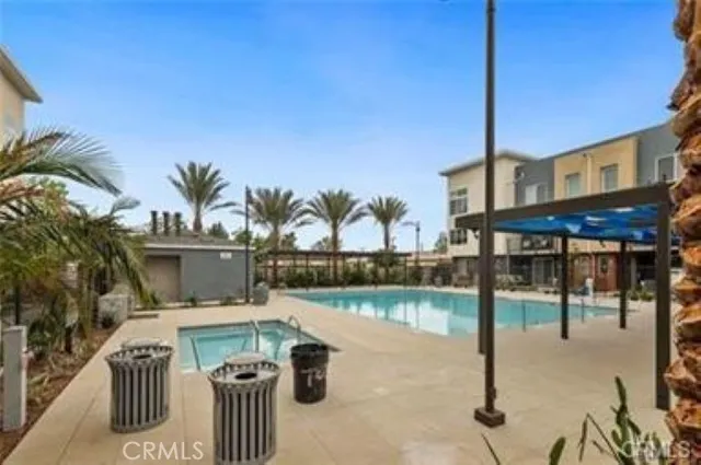 a view of a swimming pool with a patio