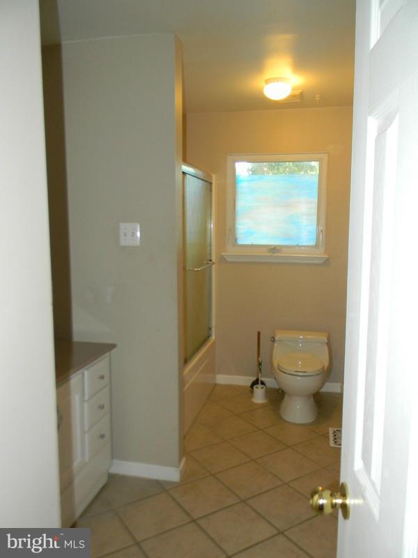 1735 Quantico Road Edgewater, MD 21037 - Photo 13 of 30 a bathroom with a toilet