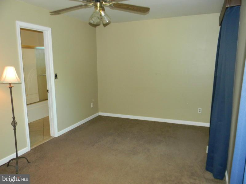 1735 Quantico Road Edgewater, MD 21037 - Photo 16 of 30 an empty room with a mirror