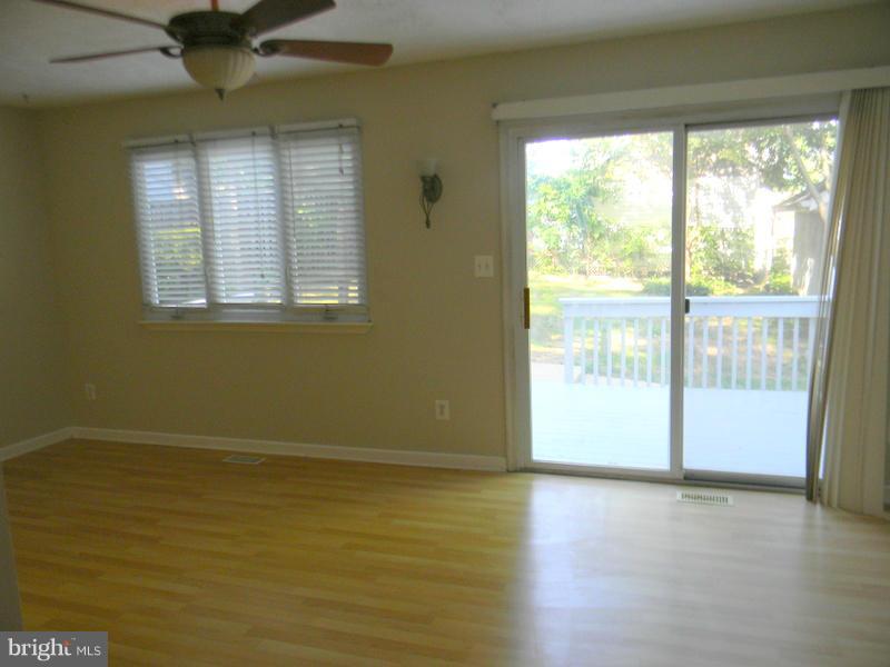 1735 Quantico Road Edgewater, MD 21037 - Photo 4 of 30 a view of an empty room with a window
