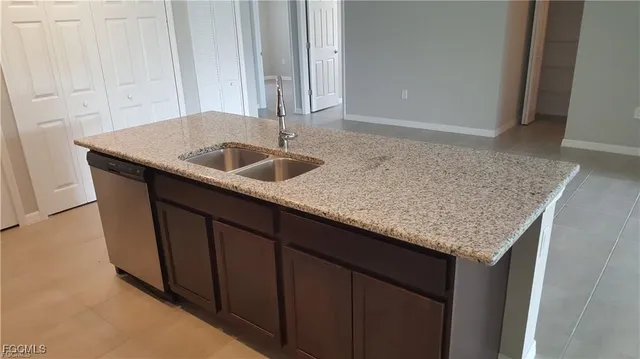 a bathroom with a white toilet and a bath tub