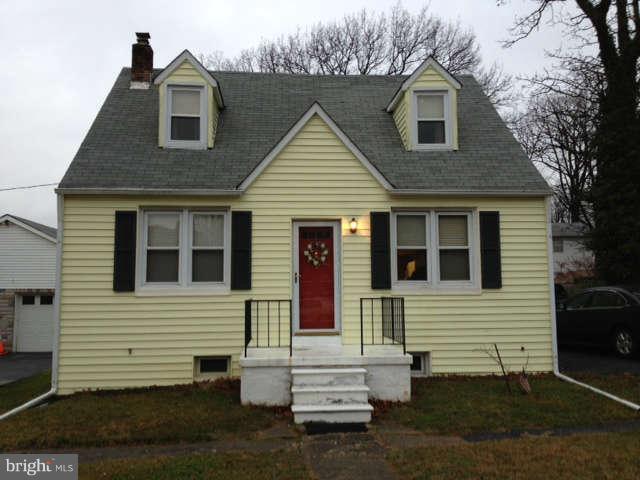 5630 Johnnycake Road Baltimore, MD 21207 - Photo 1 of 19 a view of house with a yard