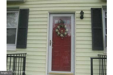 5630 Johnnycake Road Baltimore, MD 21207 - Photo 3 of 19 a view of front door and porch