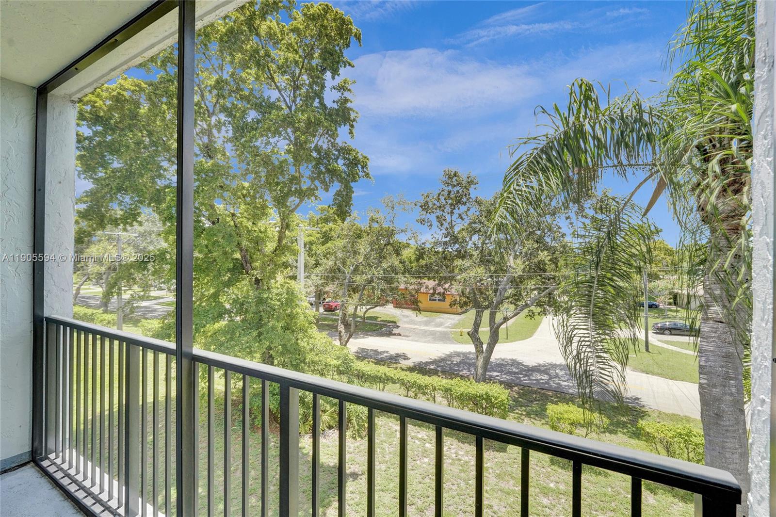 7541 Northwest 16th Street, Unit 1310 Plantation, FL 33313 - Photo 11 of 46 a view of a garden from a balcony