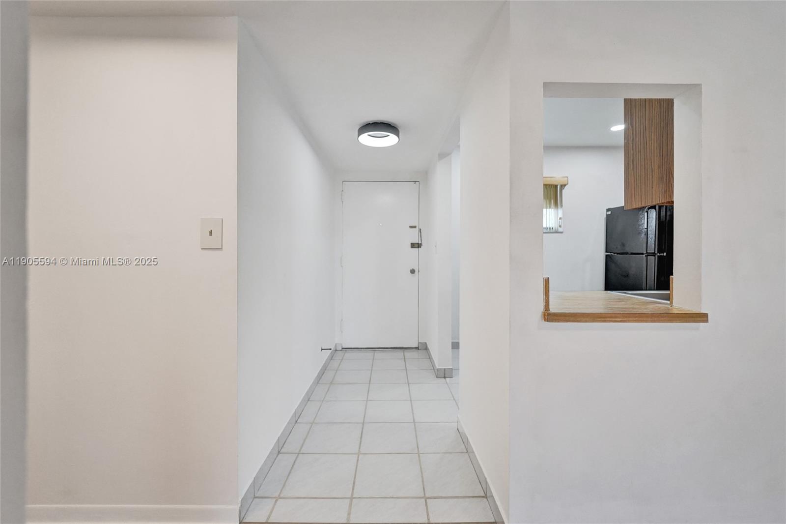 7541 Northwest 16th Street, Unit 1310 Plantation, FL 33313 - Photo 14 of 46 a view of a hallway with closet