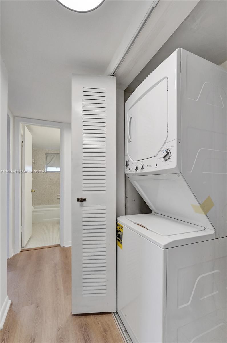 7541 Northwest 16th Street, Unit 1310 Plantation, FL 33313 - Photo 19 of 46 a utility room with dryer and washer