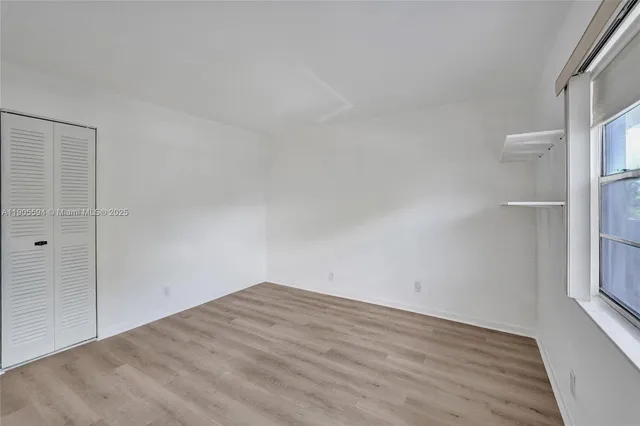 an empty room with a workbench