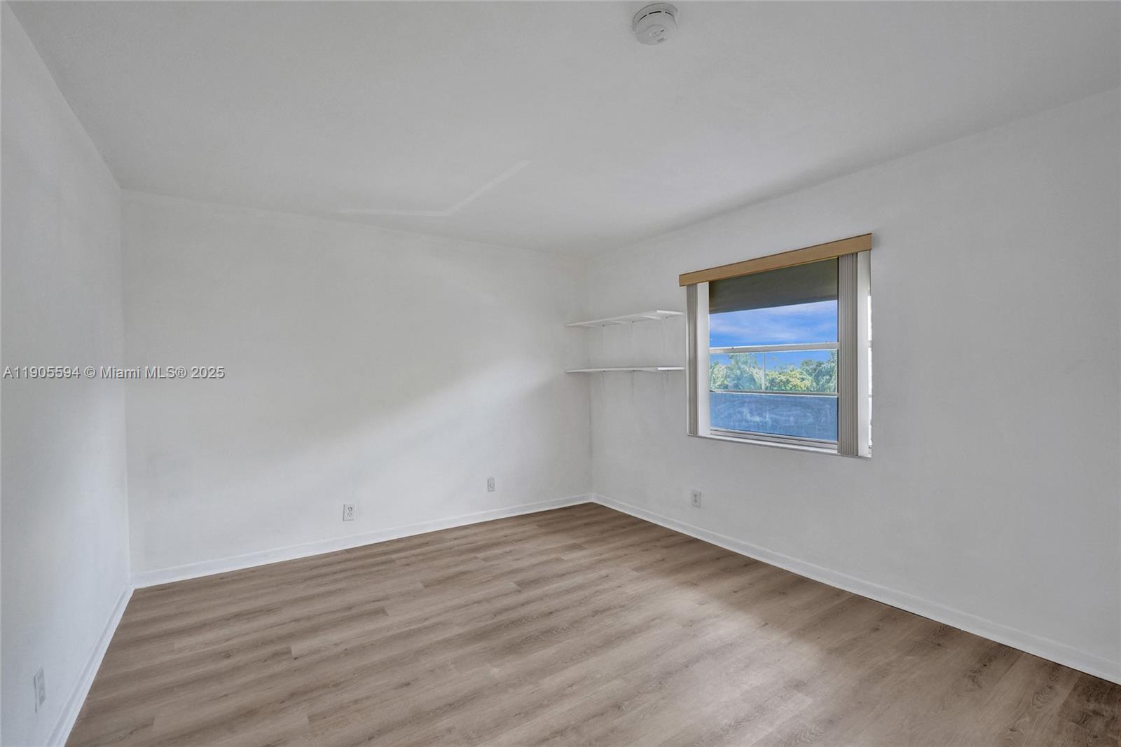 7541 Northwest 16th Street, Unit 1310 Plantation, FL 33313 - Photo 35 of 46 an empty room with a workbench