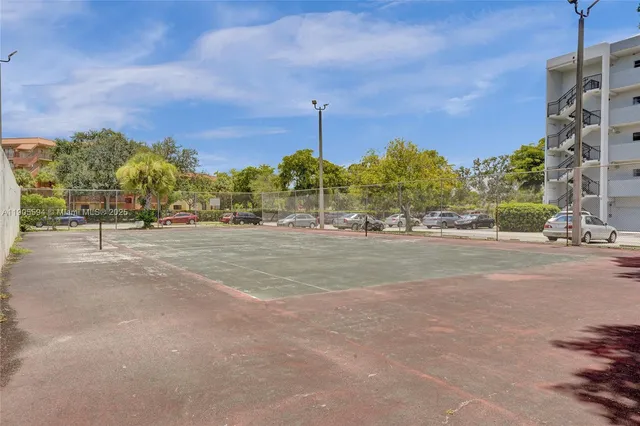 a view of street with parked cars