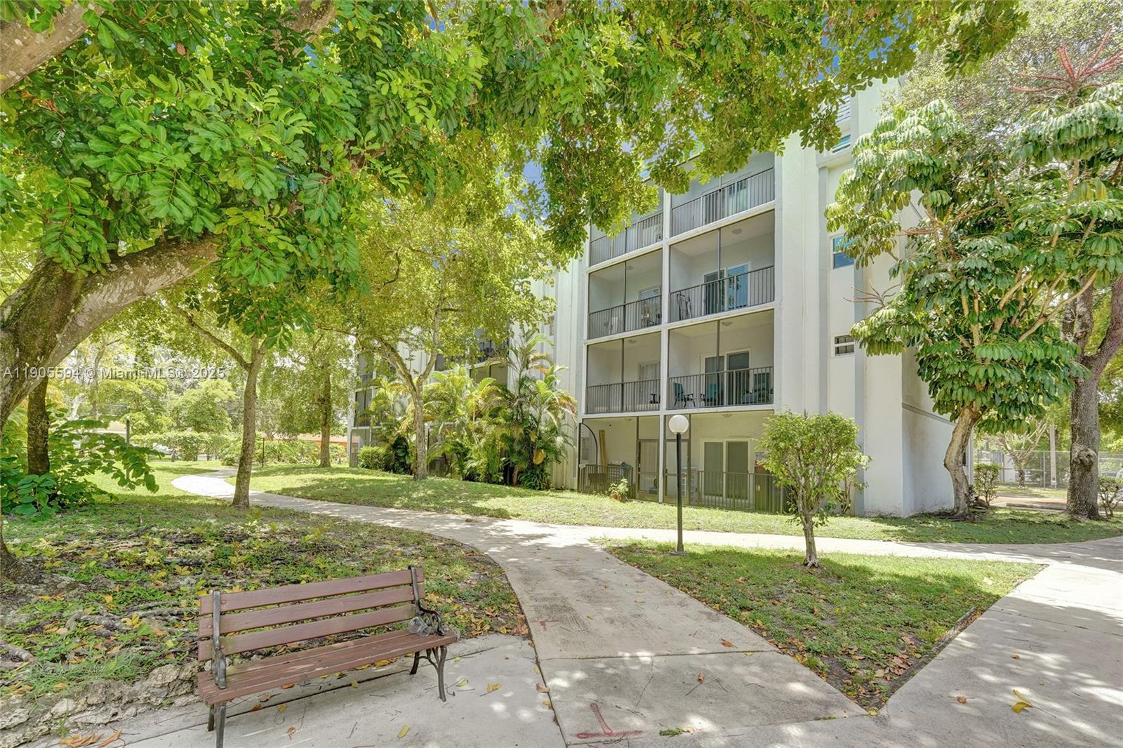 7541 Northwest 16th Street, Unit 1310 Plantation, FL 33313 - Photo 42 of 46 a view of a house with a yard