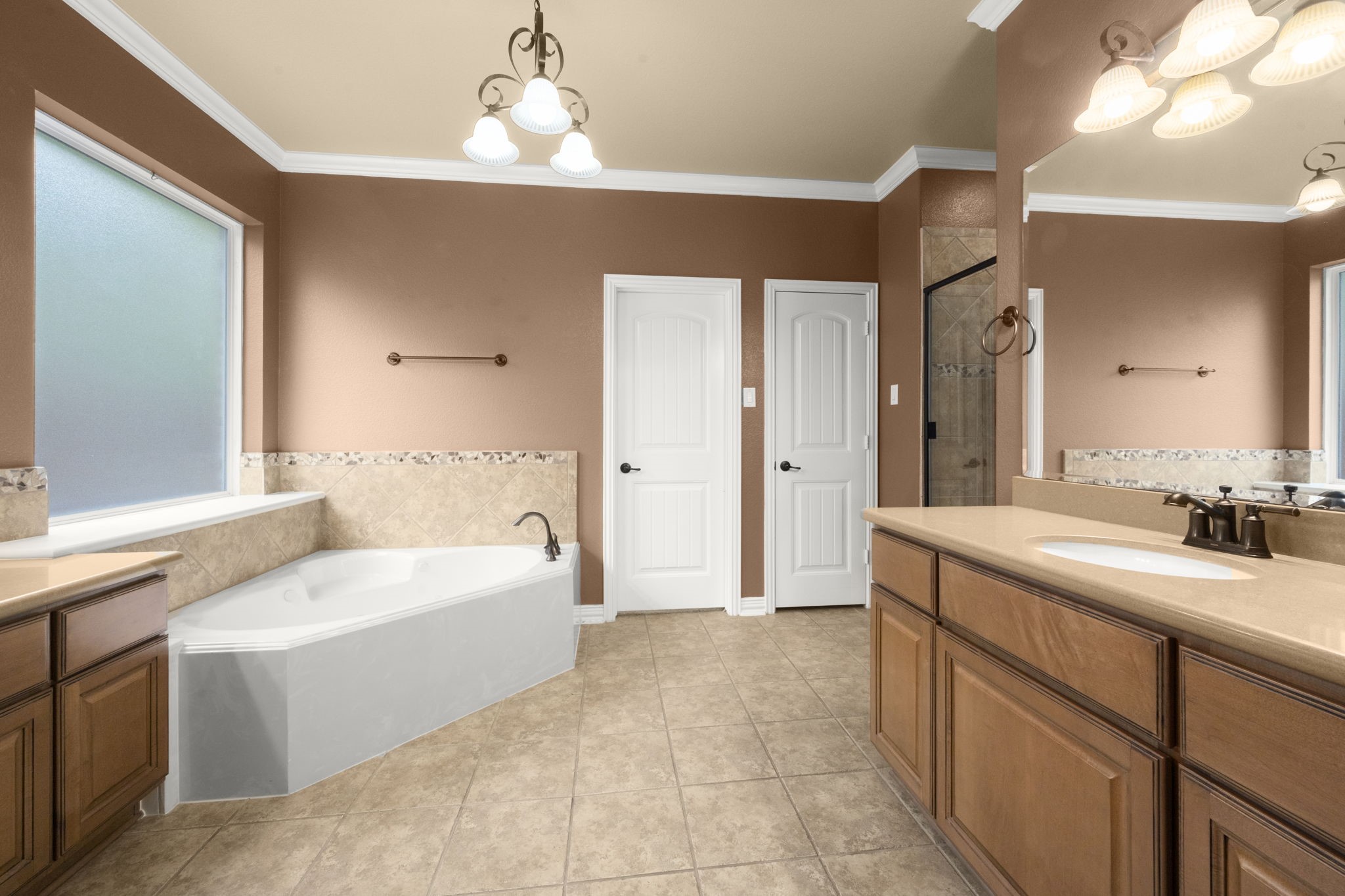 110 David Forest Lane Conroe, TX 77384 - Photo 31 of 35 a spacious bathroom with a tub sink and mirror