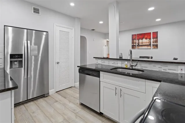 a view of a patio with backyard