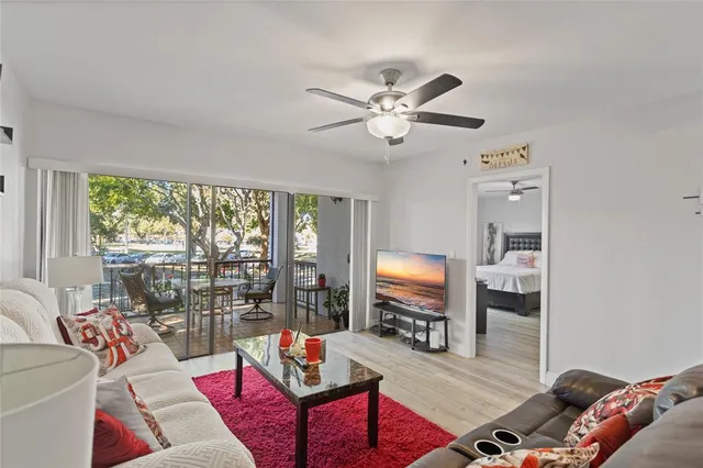 a living room with furniture and a rug