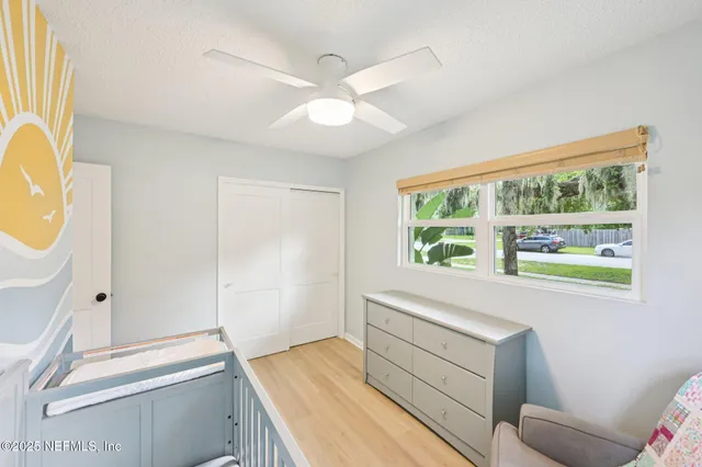 a bathroom with a sink and a large mirror