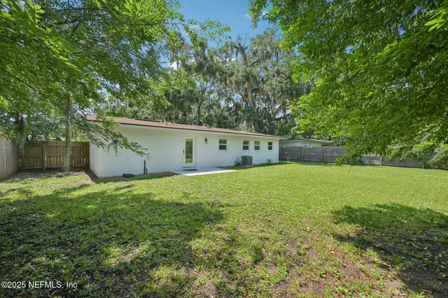 a view of a backyard with a garden