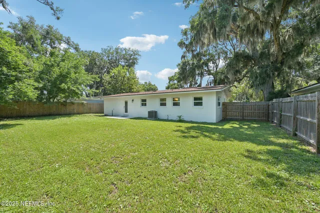 a view of a backyard with a garden