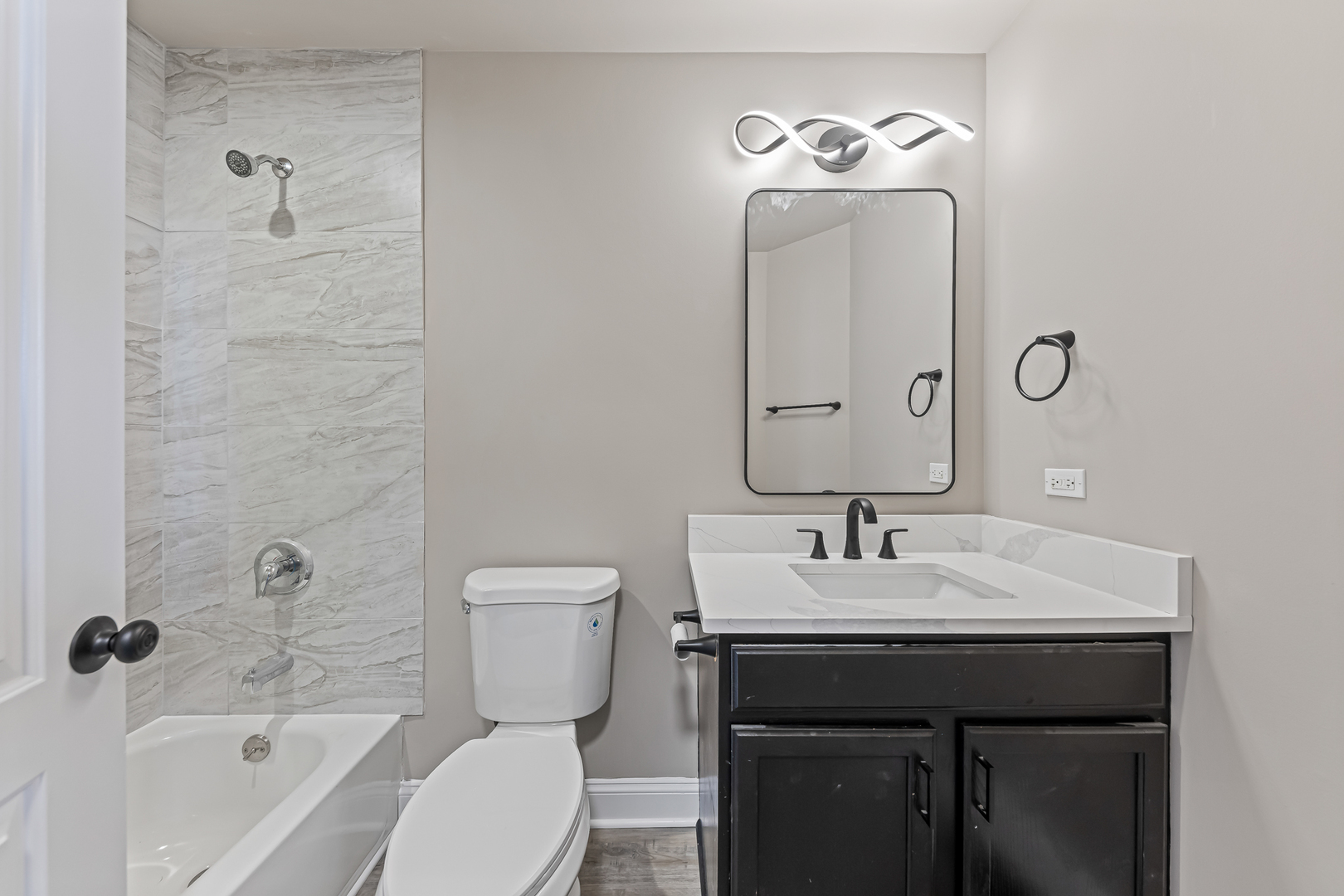 6006 West Carter Court Monee, IL 60449 - Photo 11 of 15 a bathroom with a sink toilet and shower