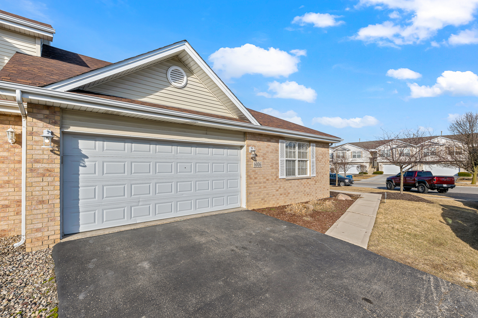 6006 West Carter Court Monee, IL 60449 - Photo 15 of 15 a view of a house with a patio