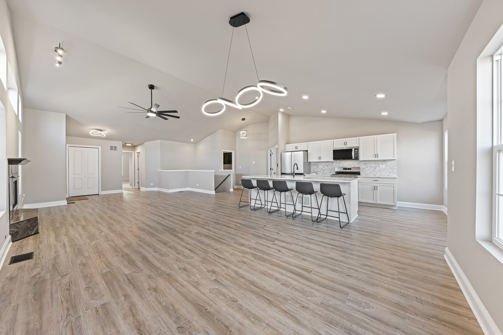 6006 West Carter Court Monee, IL 60449 - Photo 4 of 15 a room with lots of wooden furniture and a chandelier